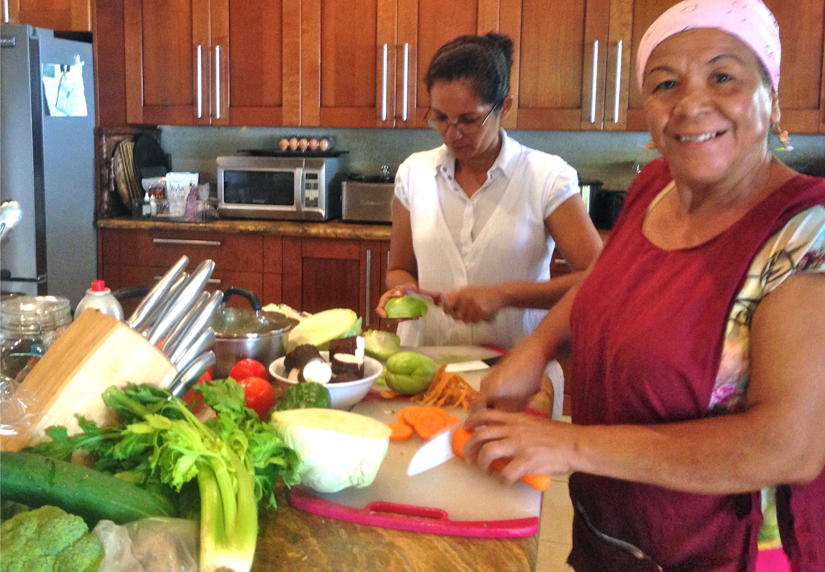 Ester and Conchita preparing veggies for our cooking lesson and authentic Nicaraguan luncheon 